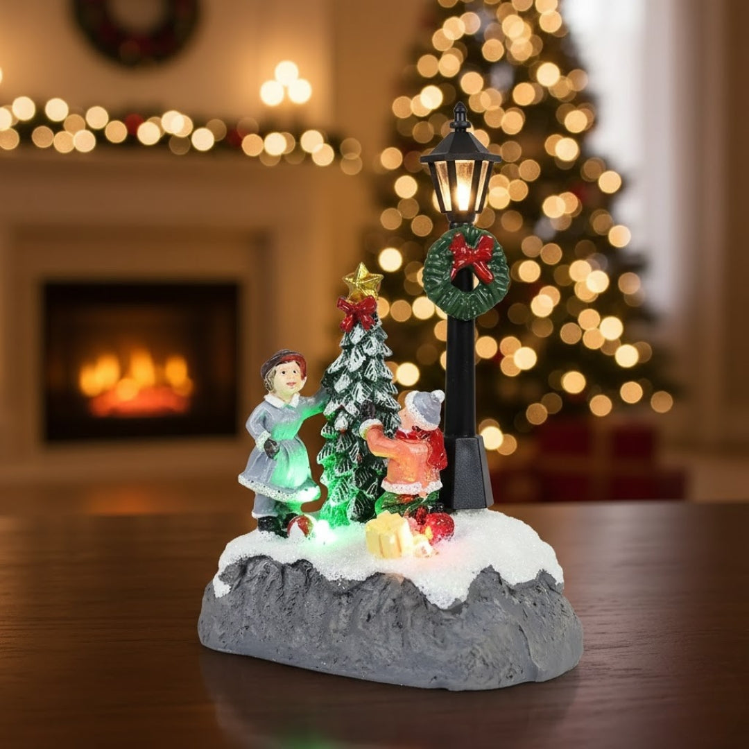 Aneta & Filip | Illuminated Christmas Scene by the Tree