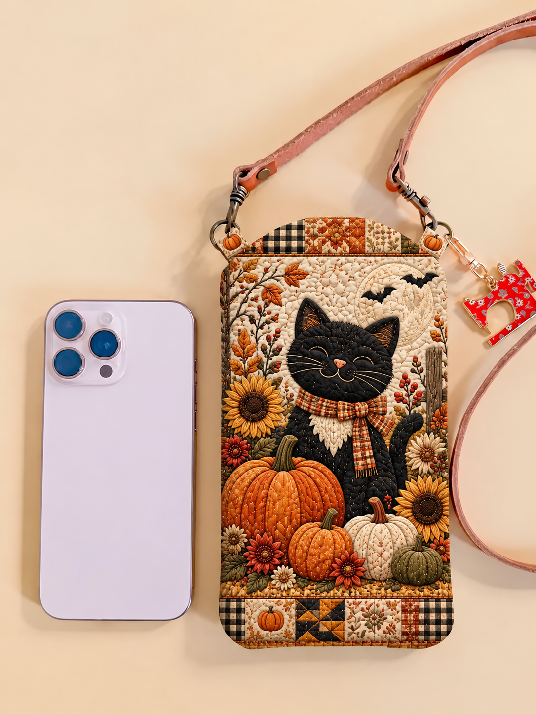 Slim Quilted Phone Crossbody Bag – Black Cat in a Pumpkin Garden – product image 1
